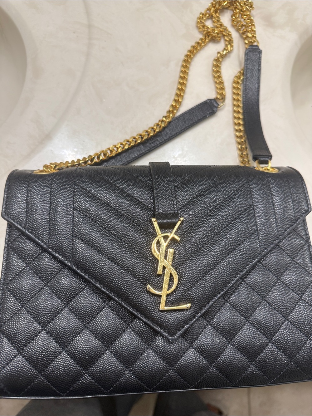 Saint Laurent Black Quilted Leather Shoulder Bag with Gold YSL Logo and Chain